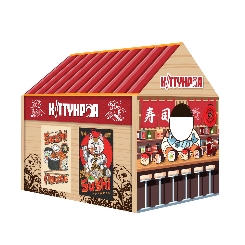 Angled view of a cardboard playhouse resembling a convenience store with a red roof, tan walls, a printed door graphic, a circular window cutout, and colorful shelf graphics displaying products.