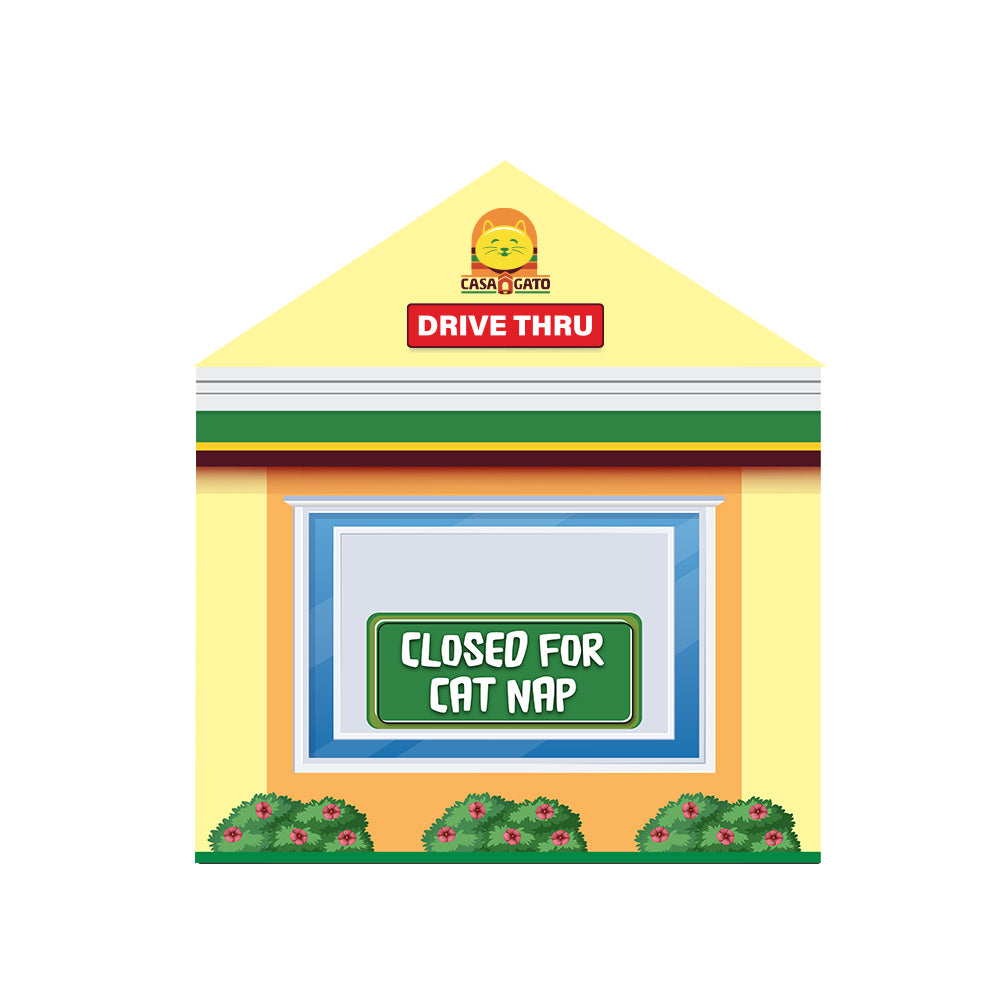 Casa Gato cardboard cat house drive-thru side with ‘Closed for Cat Nap’ sign.
