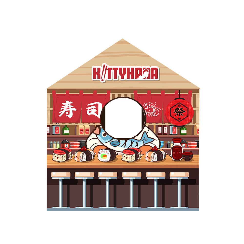 Front view of a cardboard cat house styled like a convenience store with a triangular roof, red signage, a circular cutout entrance in the center, and printed shelves stocked with various illustrated items below