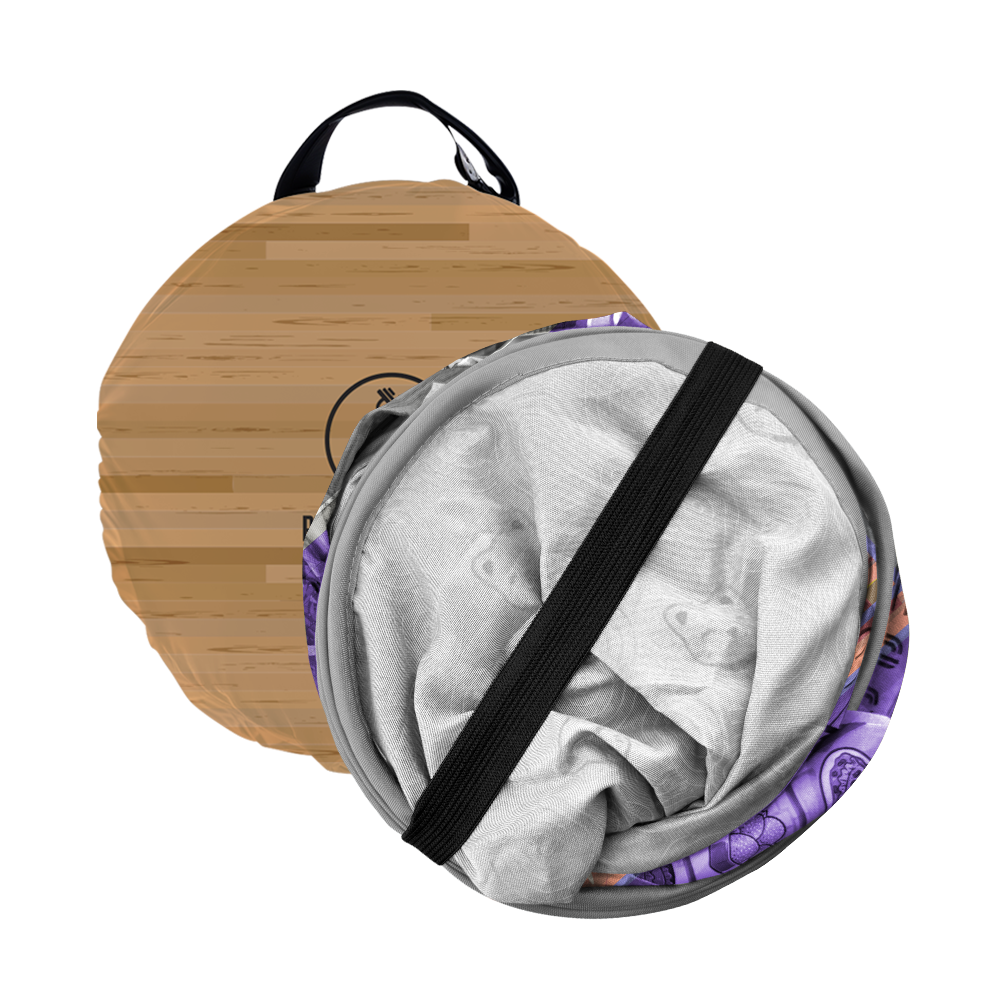Folded portable pet tent in a circular carrying bag; one side shows a brown textured cover with a handle, while the other side shows the silver interior secured with a black strap.