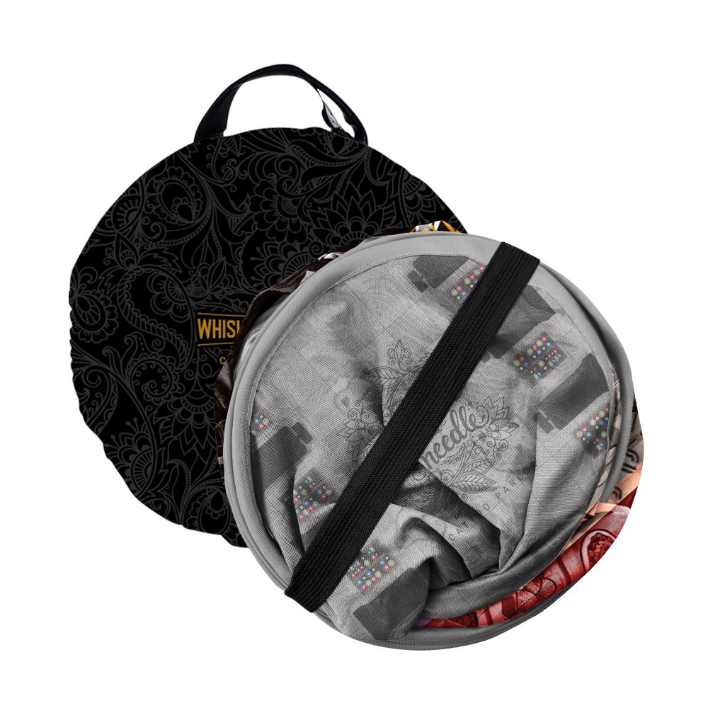 Two folded portable cat tents in black and gray color variations, shown compactly packed with carrying handles and elastic straps securing them for easy storage and transport