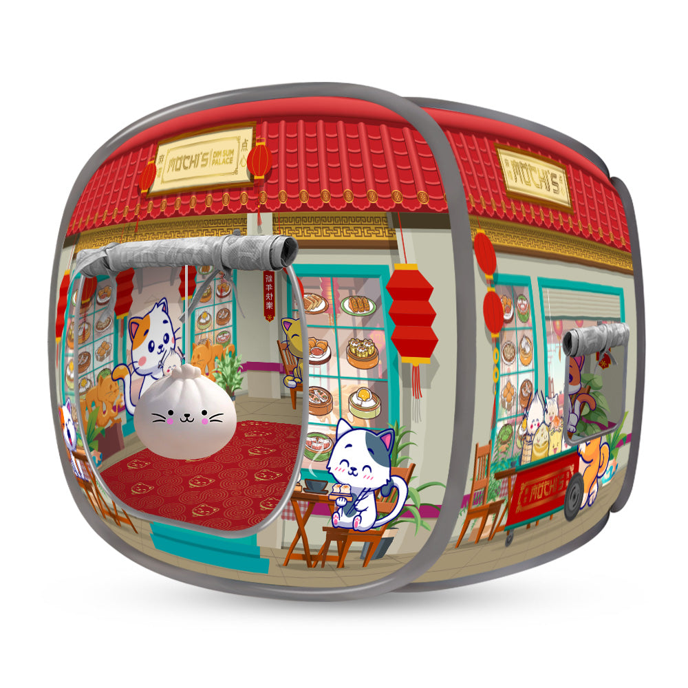 Mochi’s Dim Sum Palace pop-up cat house with cartoon cats and bun toy.