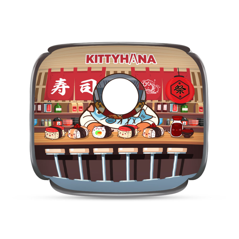 Round cat house with ‘Kitty Tina’ sign, red shelves, treats, and a circular entrance.